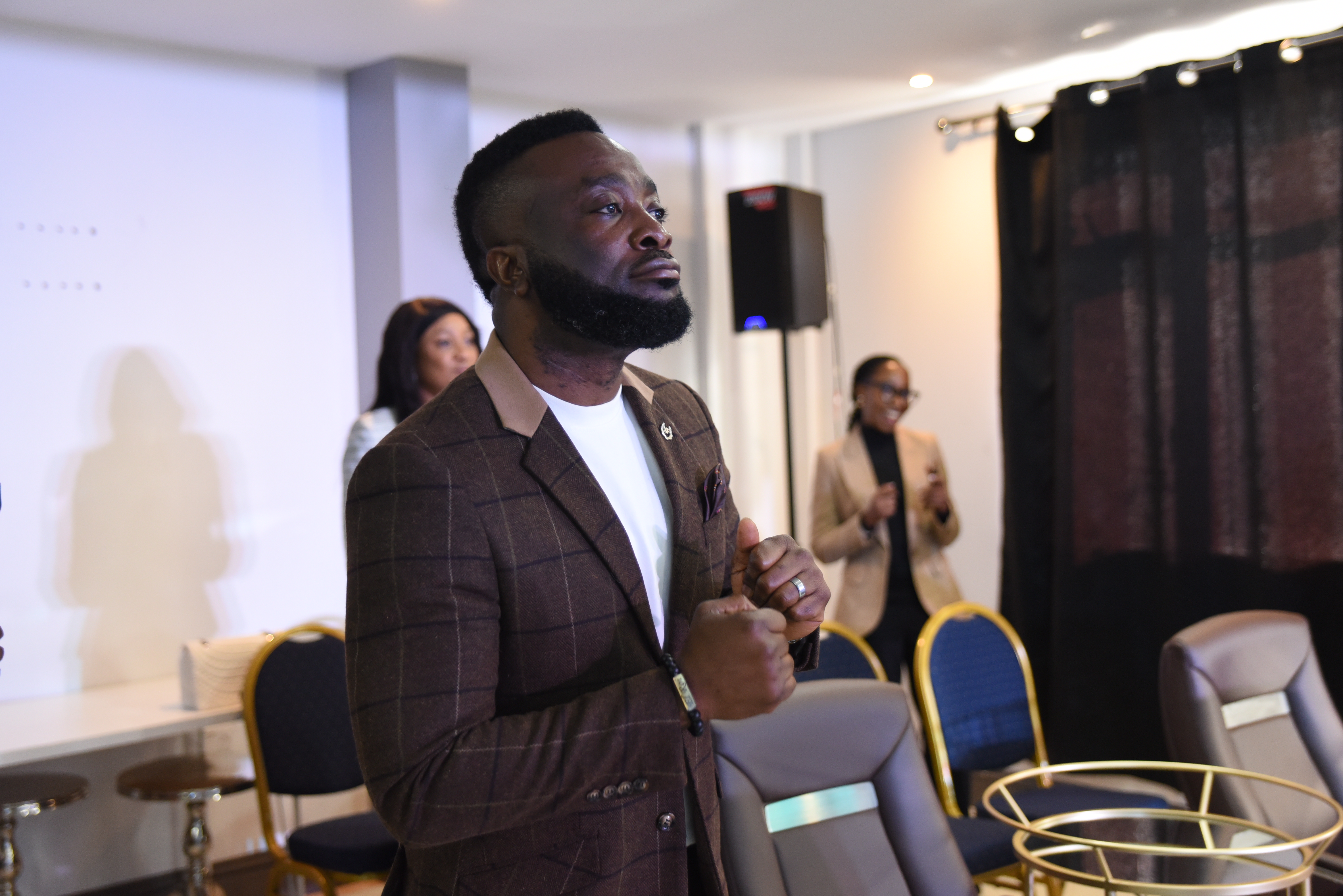 Pastor Phreddy in a reflective moment during service